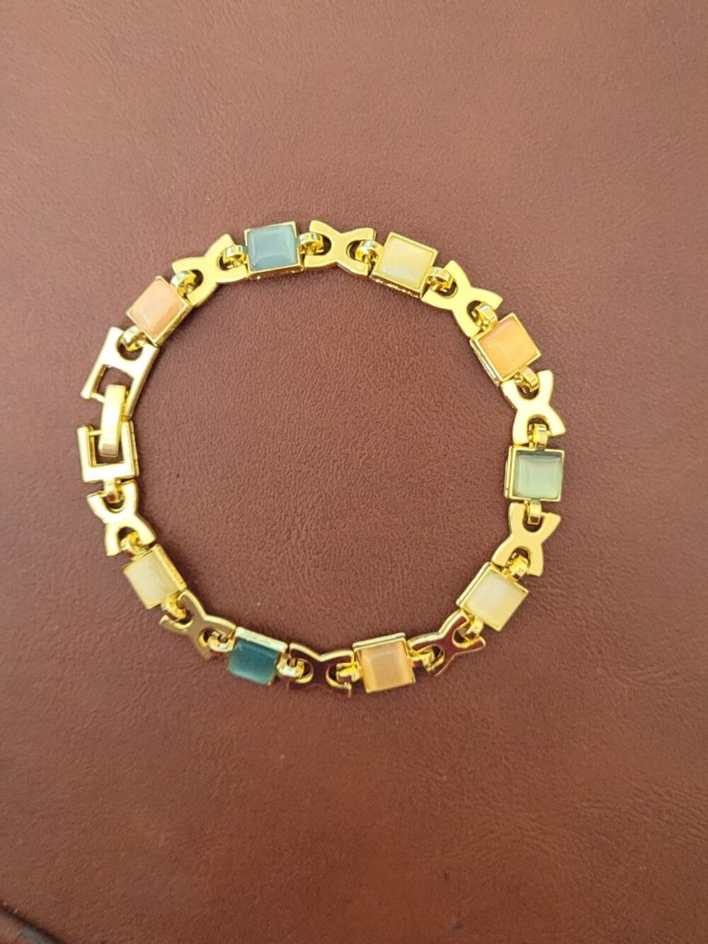 Gold Linked Bracelet with Multi Colored Stones